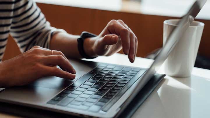 Typing On Laptop
